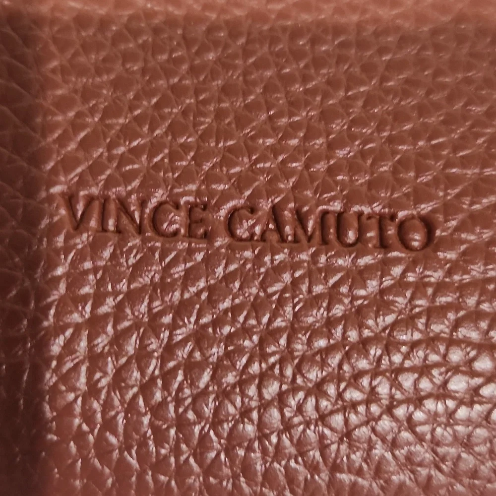 Vince Camuto questions leave